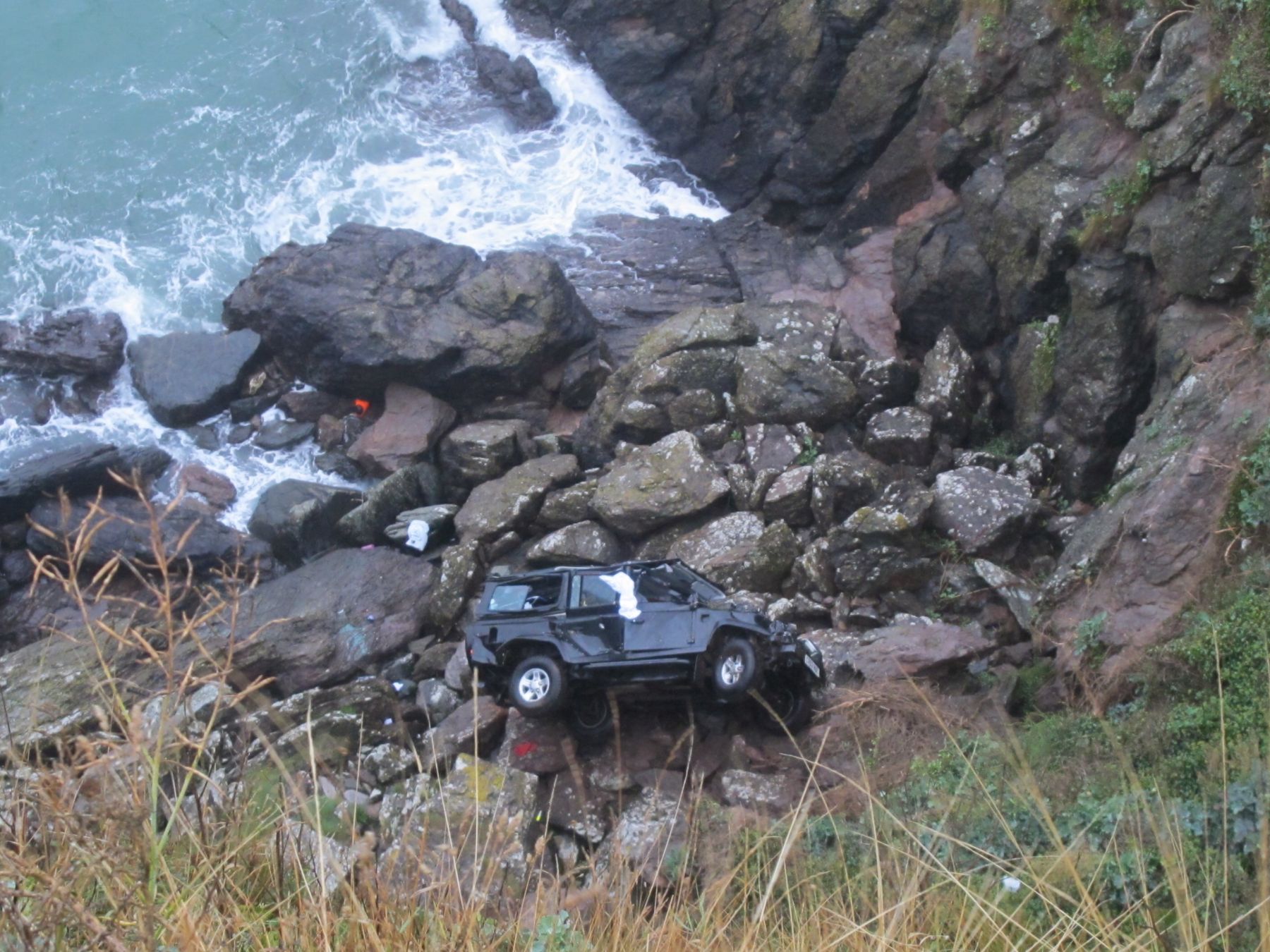 Car out of control goes over cliff