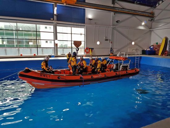 An Atlantic 85 lifeboat about to be capsized in the Sea Survival Pool 