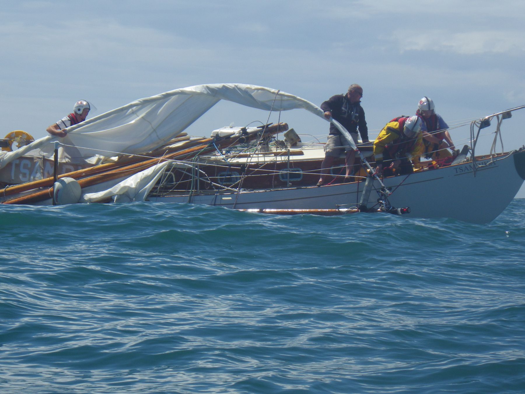 Dart & Torbay RNLI work on the rigging after dismasting